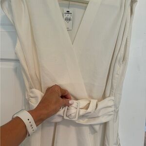 NWT, Express cream color top with fabric belt. Never worn, just doesn’t fit me.